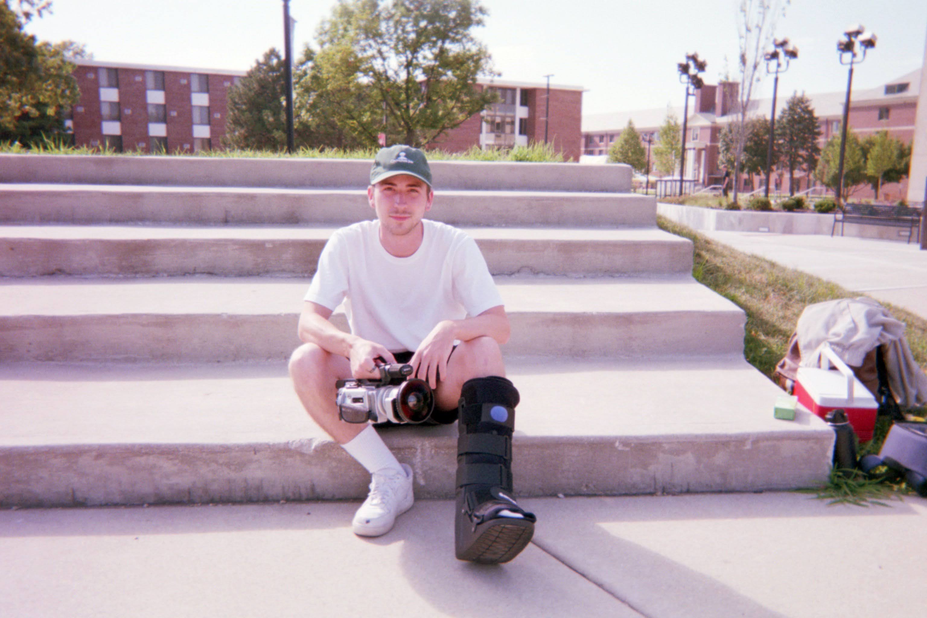 Ethan, our (now retired) VX2000, and his boot courtesy of the spot behind him a few weeks prior - Dekalb, IL, Summer 2020.